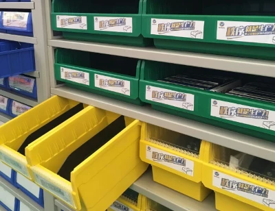 warehouse-plastic-parts-bins-on-shelves warehouse-plastic-parts-bins-on-shelves